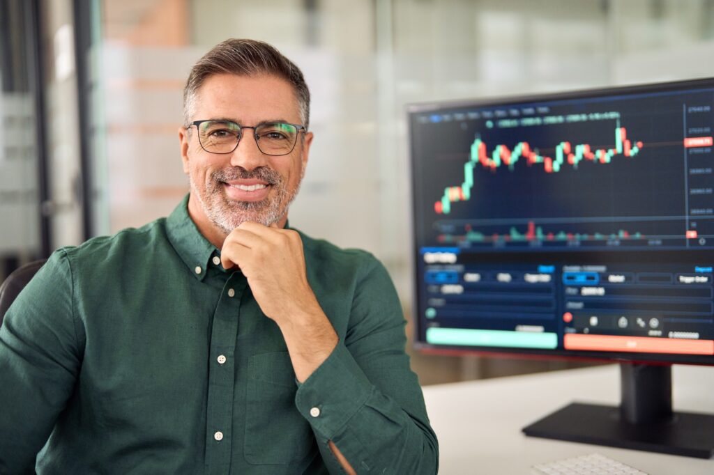 Happy stock investor or broker, trader or financial expert advisor, portrait.